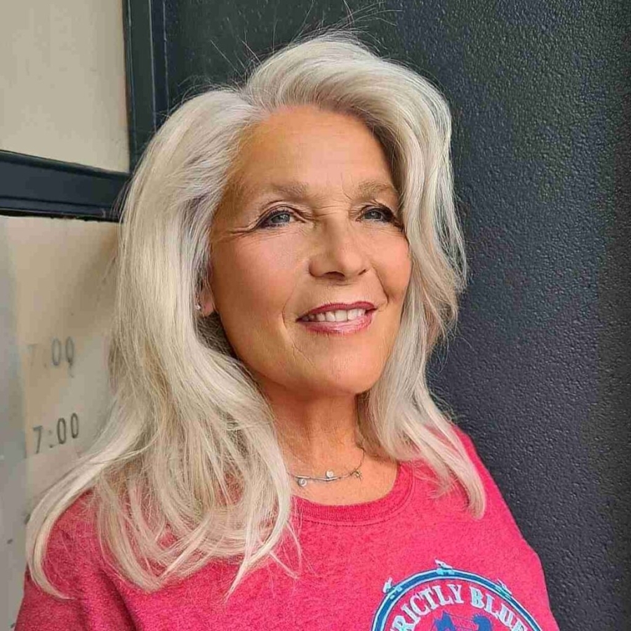 Bleach Blonde Layered Hair on Medium Cut