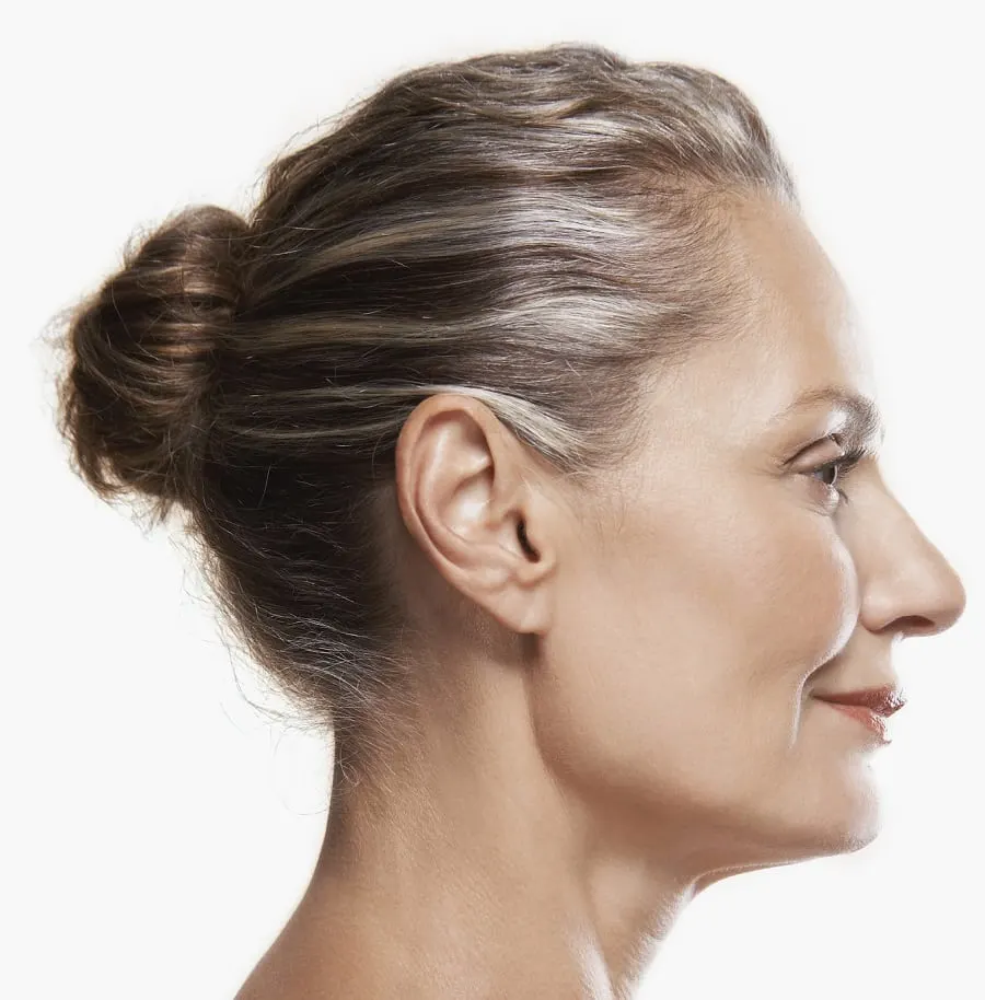 everyday bun hairstyle for women over 50